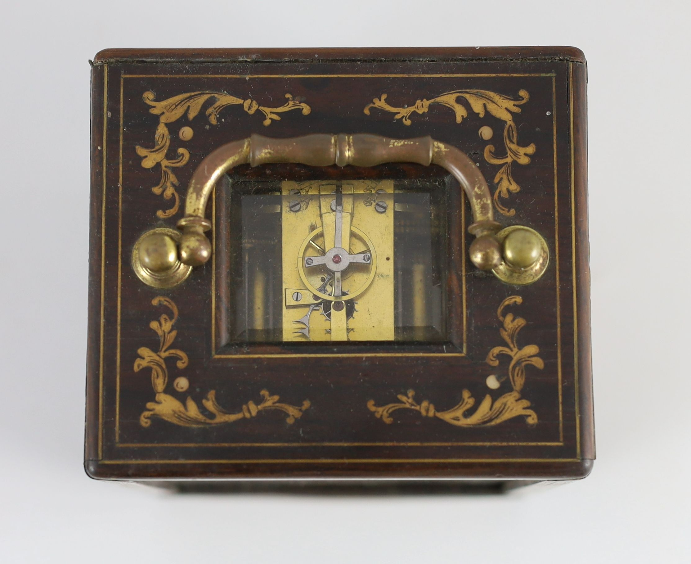 Paul Garnier of Paris. A mid 19th century French inlaid rosewood travelling carriage timepiece, height of case 14.5cm, width 11cm depth 9.5cm